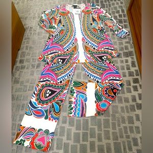 Eva Varro set, size small, with cut out arms brand new never worn both pieces